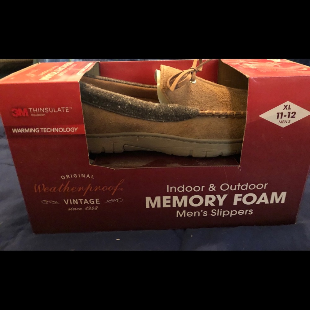 New in Box men’s slippers with memory foam soles.